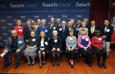 Photo of a group of alumni. Link to Life Stage Gift Planner Ages 45-65 Situations.