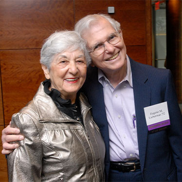 Couple hugging and smiling. Read about Closely Held Business Stock